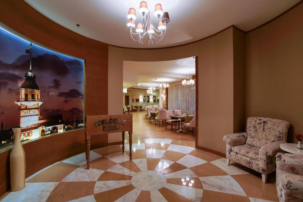 Limak Atlantis De Luxe Hotel & Resort reģistrācijas zona ar modernu interjeru