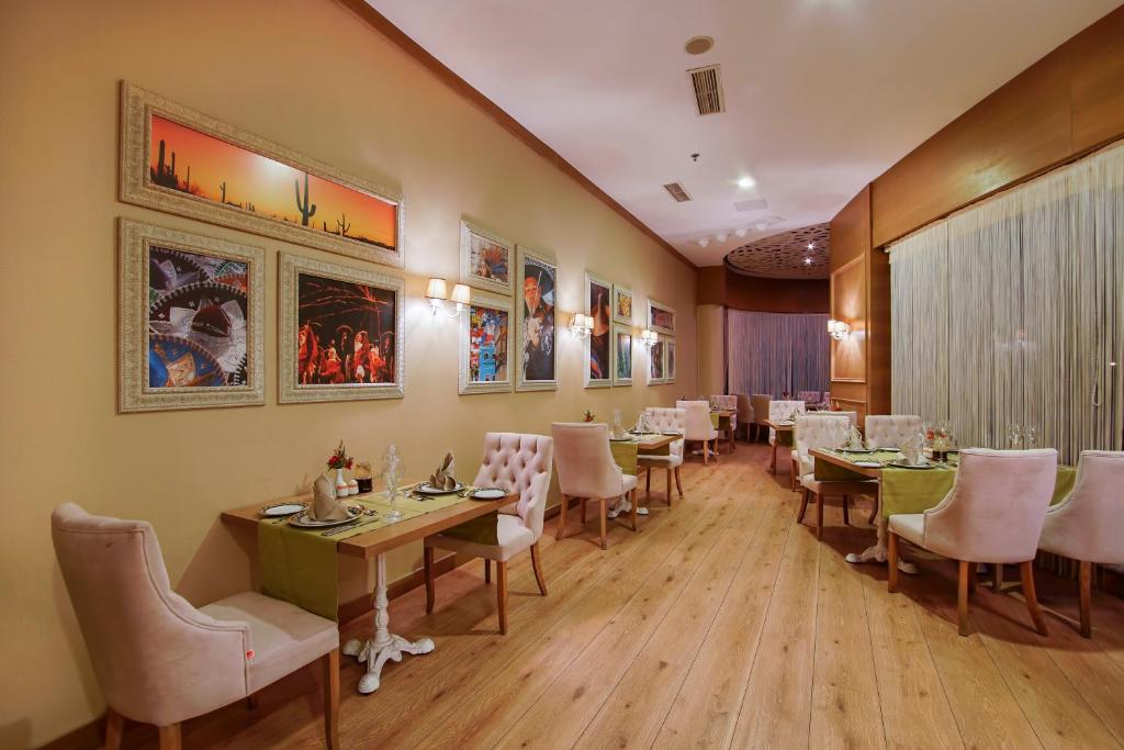 Eleganta restorāna iekārtojums Limak Atlantis De Luxe Hotel & Resort.