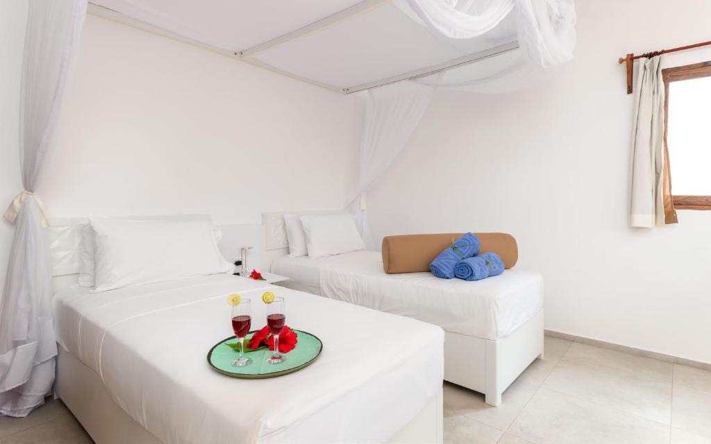 Numurs Sandies Baobab Beach viesnīcā ar divām gultām.