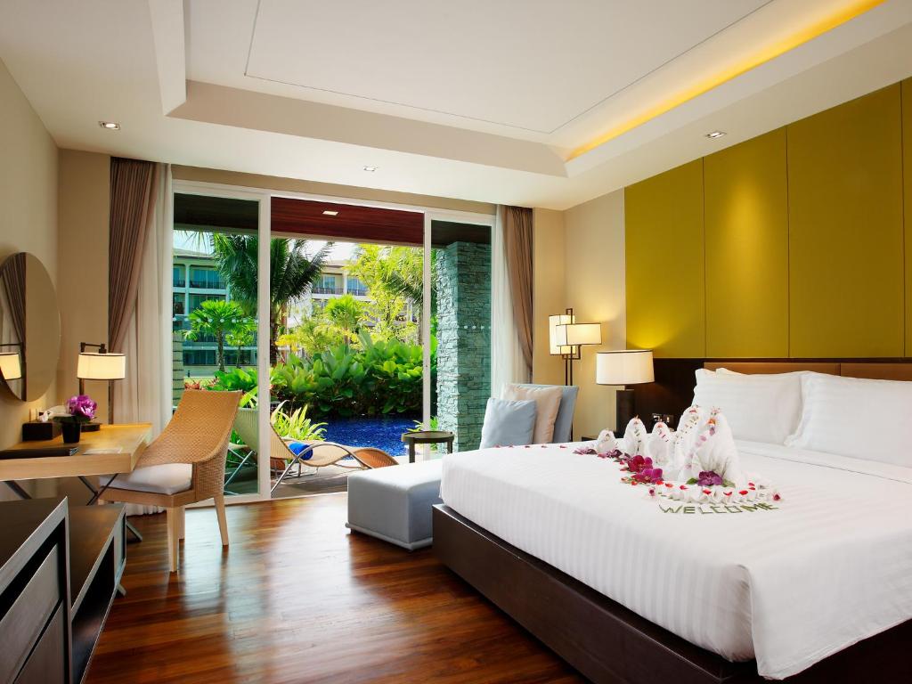 Mūsdienīgs numurs Graceland Khaolak Resort & Spa ar skatu uz dārzu.