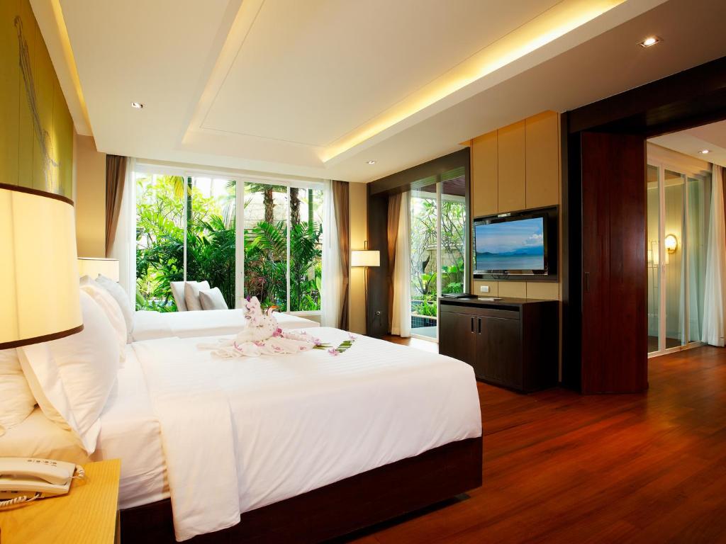 Mūsdienīgs numurs Graceland Khaolak Resort & Spa ar skatu uz dārzu.