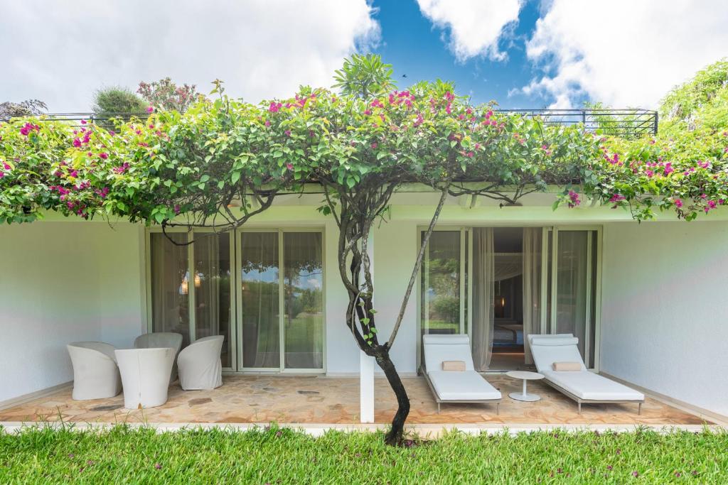 Elegants bungalo pie dabas RIU Palace Zanzibar.