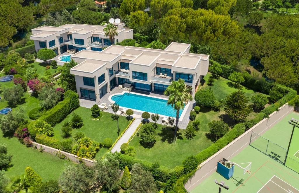 Susesi Luxury Resort grezna villa ar baseinu un dārzu piekrastē