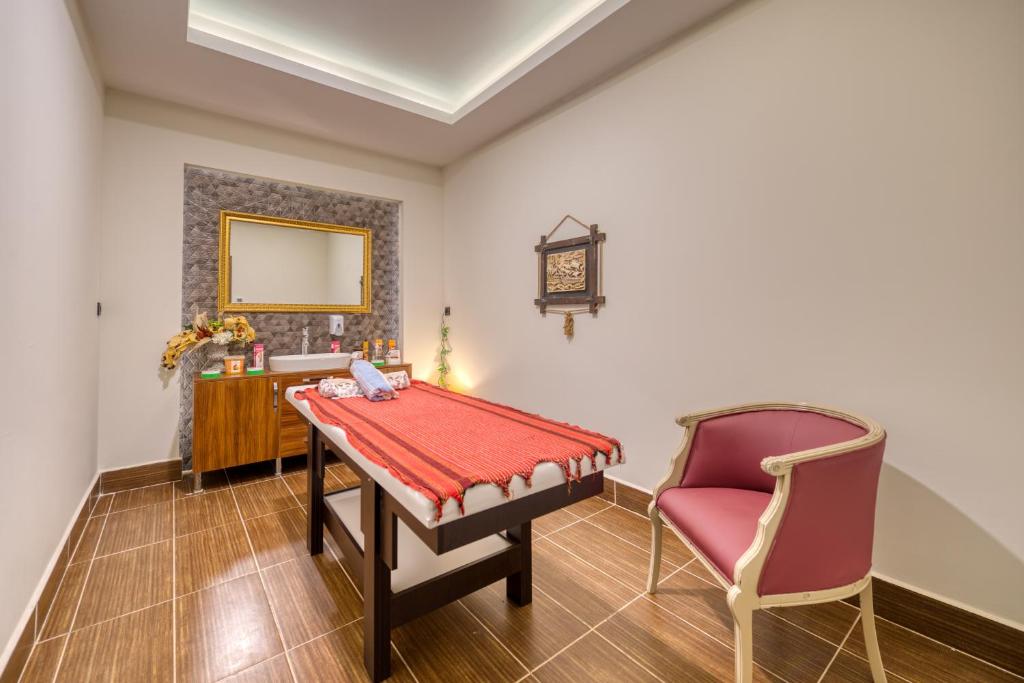 Sealife Kemer Resort Hotel spa masāžas telpa ar relaksējošu atmosfēru