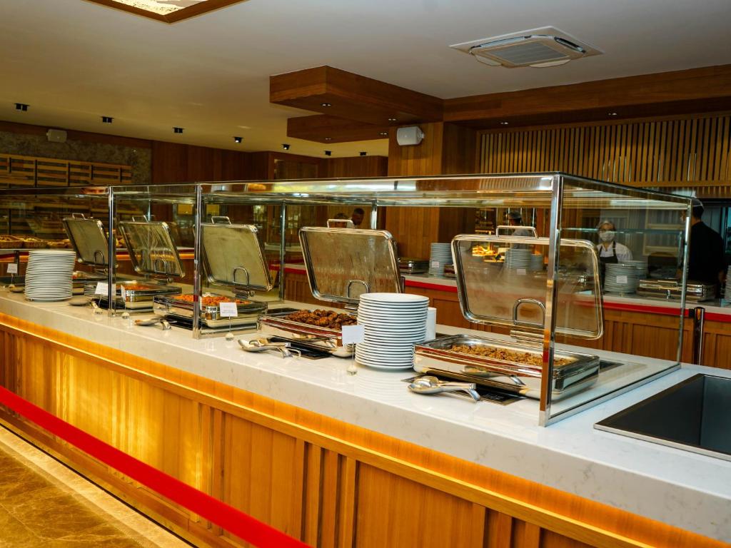 Bufetes galda klāšana ar ēdieniem Blue Dreams Resort & Spa