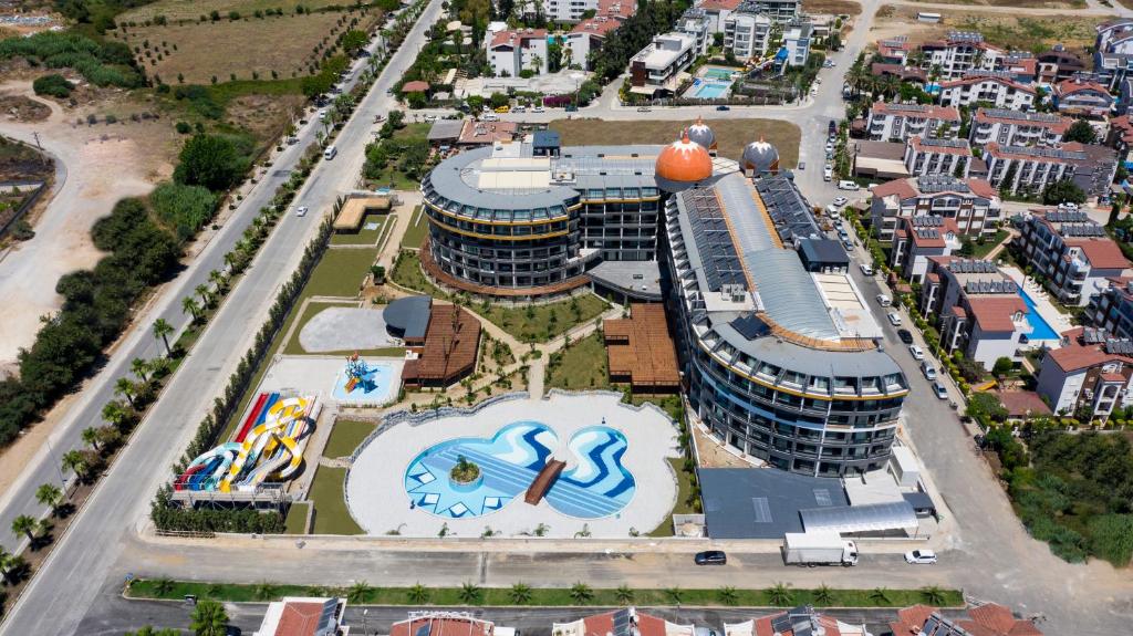 Aerial view of Arnor De Luxe Hotel & Spa with pool and slides.