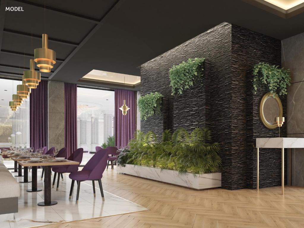 Eleganta ēdamzāle viesnīcā Riu Madeira ar mūsdienīgu interjeru.