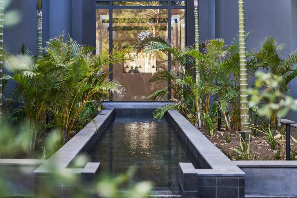 Zaļš dārzs ar ūdens kanālu LUX* Grand Baie