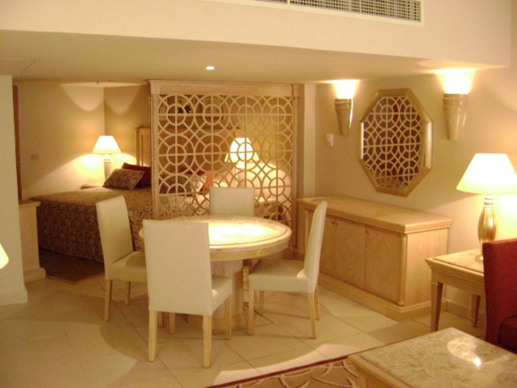 Iberotel Palace numurs ar ēdamzonu un viesnīcas interjeru