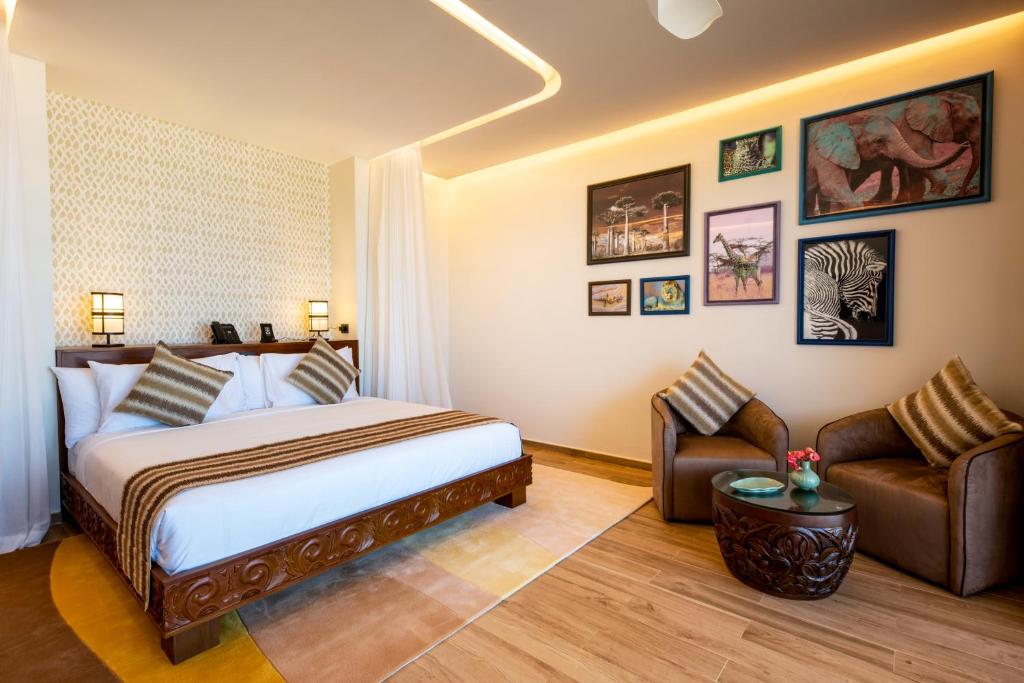 Elegants numurs ar mākslas darbiem The Mora Zanzibar.