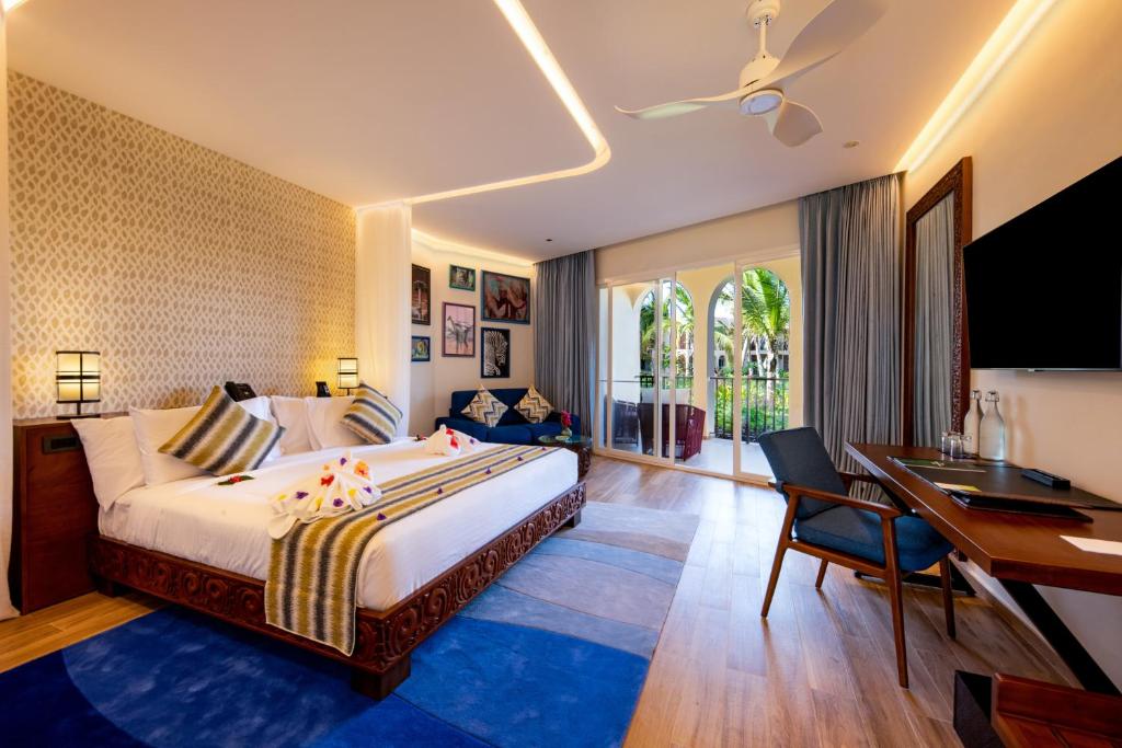 Numurs ar skatu uz dārzu viesnīcā The Mora Zanzibar.