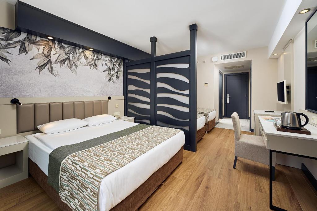 Moderns numurs ar divām gultām un elegantu dizainu Seaden Sea World Resort & Spa