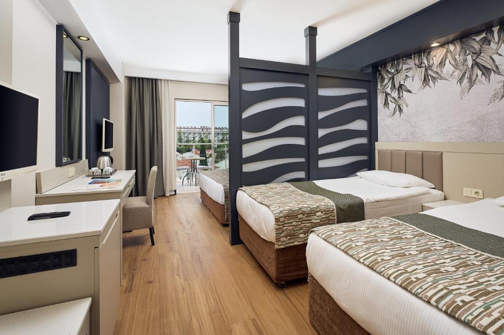 Moderns numurs viesnīcā Seaden Sea World Resort & Spa ar divām gultām.