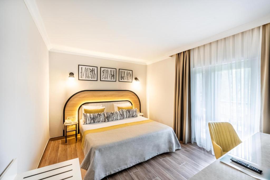 Moderns numurs ar divguļamo gultu viesnīcā Club Marco Polo