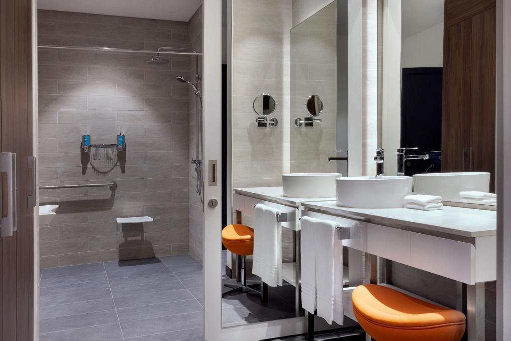 Aloft Al Mina modern bathroom with accessible features