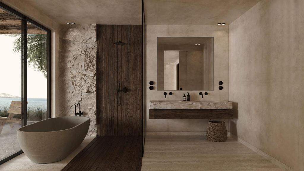 Mūsdienīgs vannas istabas dizains OKU Bodrum ar skatu uz piekrasti.