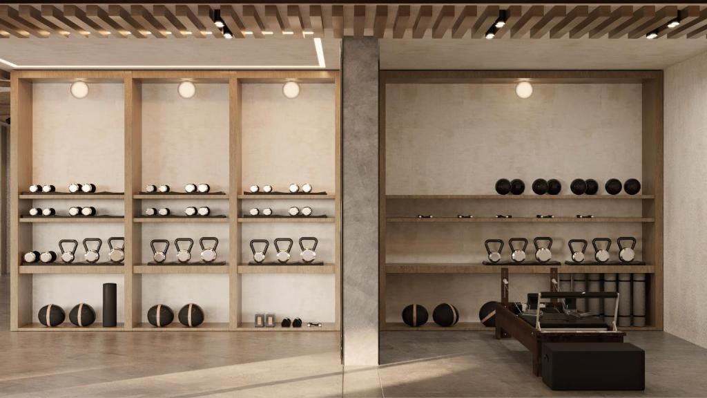 Moderns fitnesa centrs ar svaru un treniņu aprīkojumu, OKU Bodrum