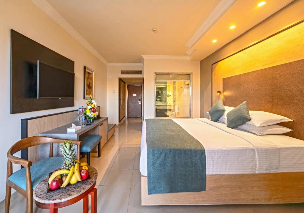 Moderns numurs ar divguļamo gultu un televizoru, Xperience Kiroseiz Parkland