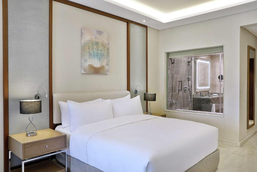 Moderns numurs ar ērtiem gultas veļas komplektiem Hilton Hurghada Plaza