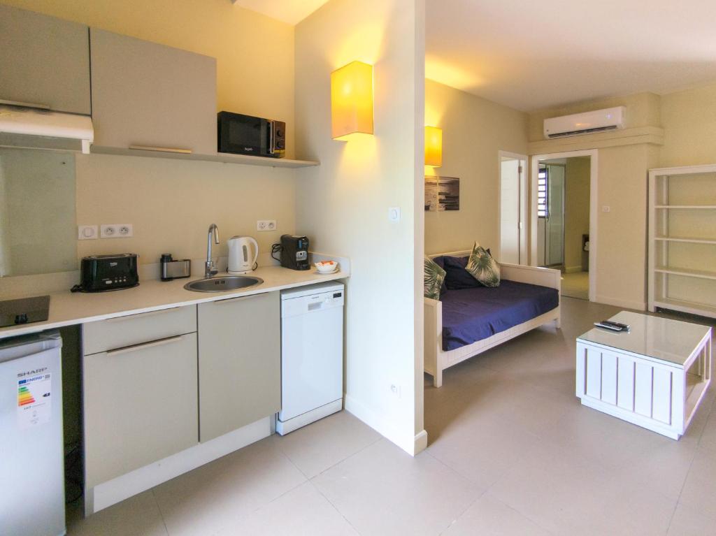 Be Cosy Apart Hotel numurs ar virtuvi un viesistabu, gaišs un mājīgs