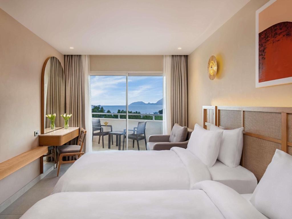 Rixos Premium Tekirova numuri ar skatu uz jūru un balkonu