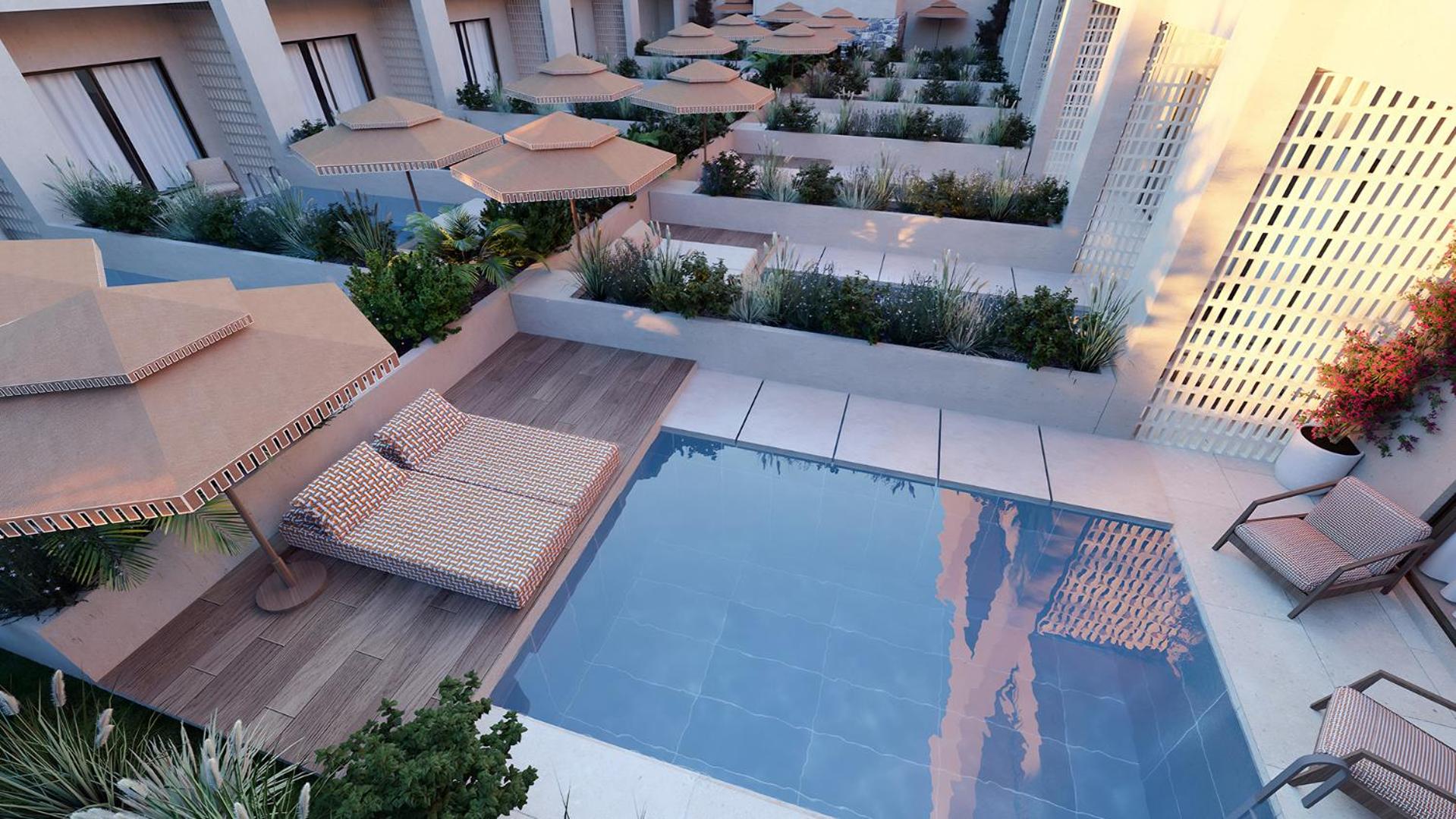 Vasia Hotel & Spa numurs ar tiešu piekļuvi baseinam un privātu terasi — moderns dizains ar sauļošanās gultu un saulessargu