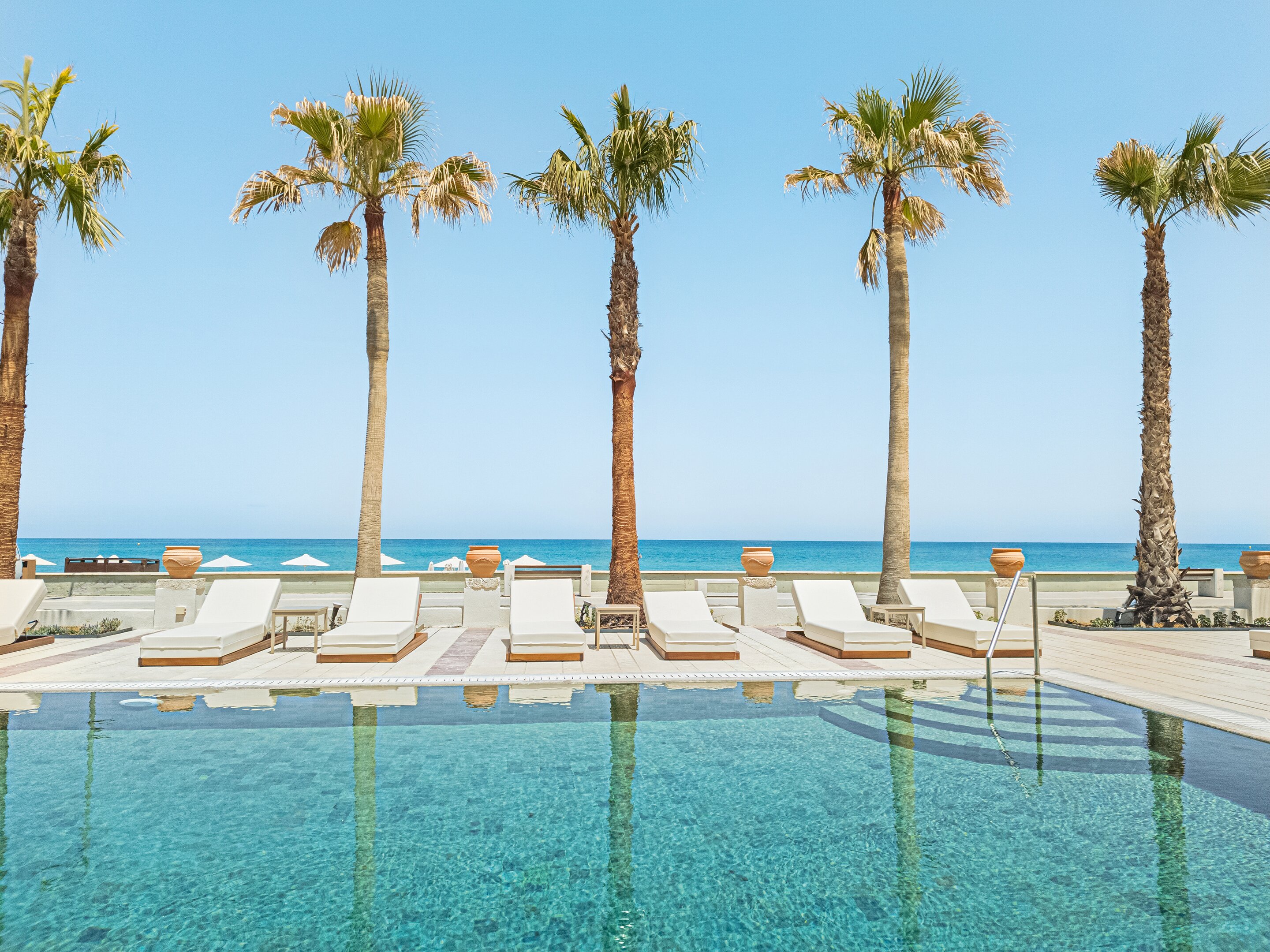 Grecotel Plaza Beach House panoramic view with beach and pools