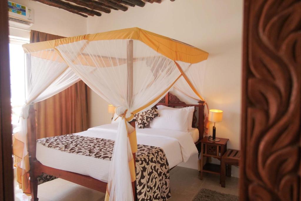 Isla Bonita Zanzibar Beach Resort numurs ar baldahīna gultu