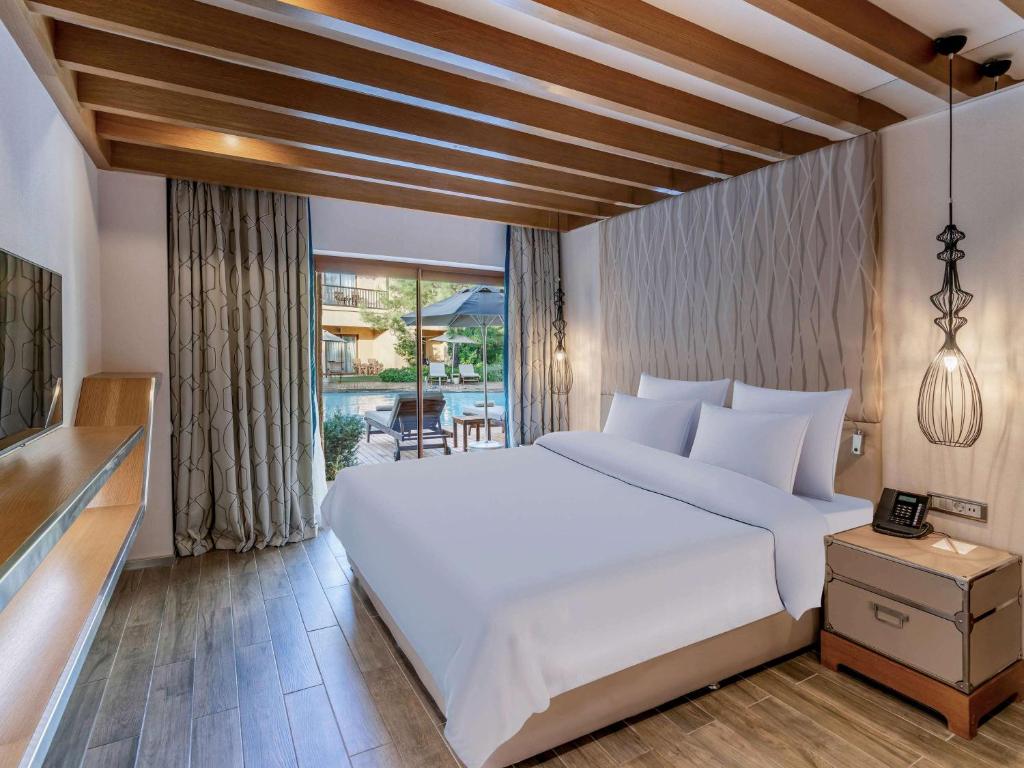 Mūsdienīgs numurs ar skatu uz baseinu Rixos Premium Belek