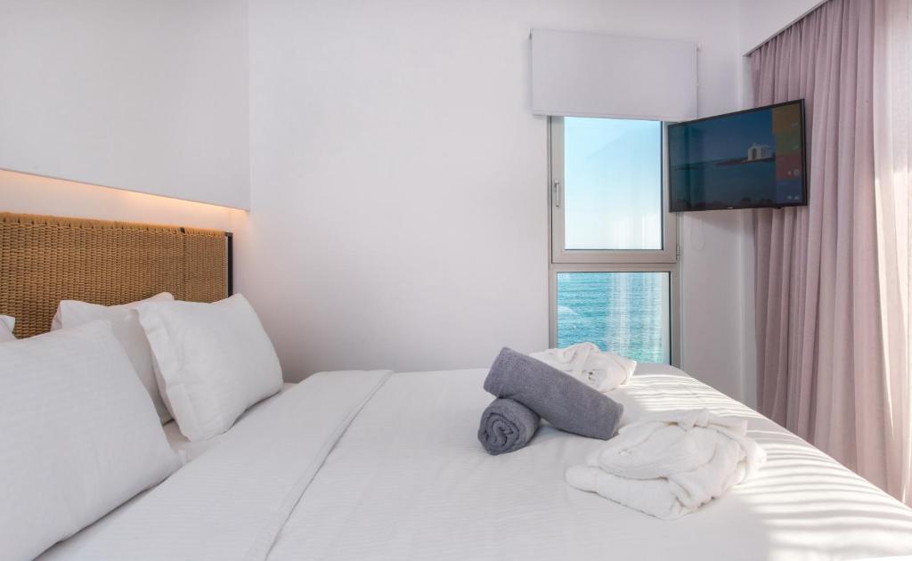 Gultas numurs ar skatu uz jūru Enorme Ammos Beach Resort