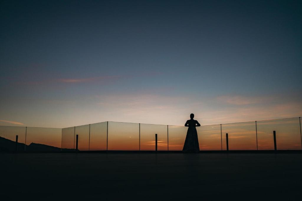 Silhouette of a person at sunset at Sheraton Rhodes Resort