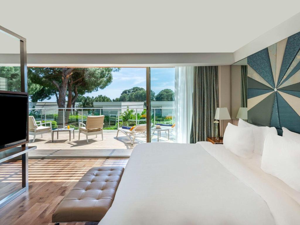 Rixos Premium Belek numurs ar terasi un dārza skatu