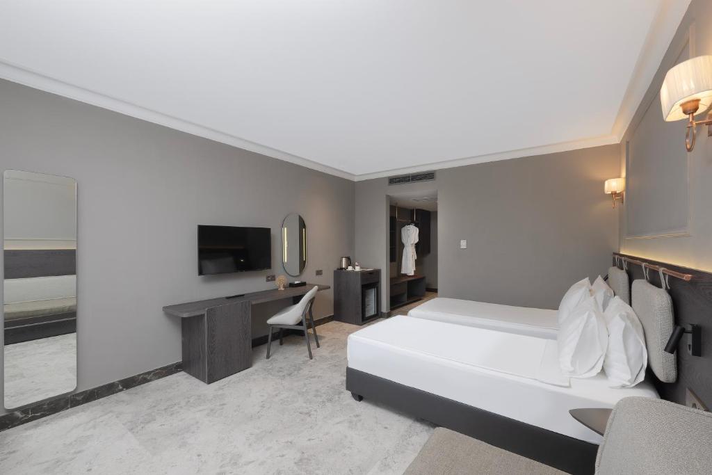 Moderns numurs ar divām gultām Adora Hotel & Resort