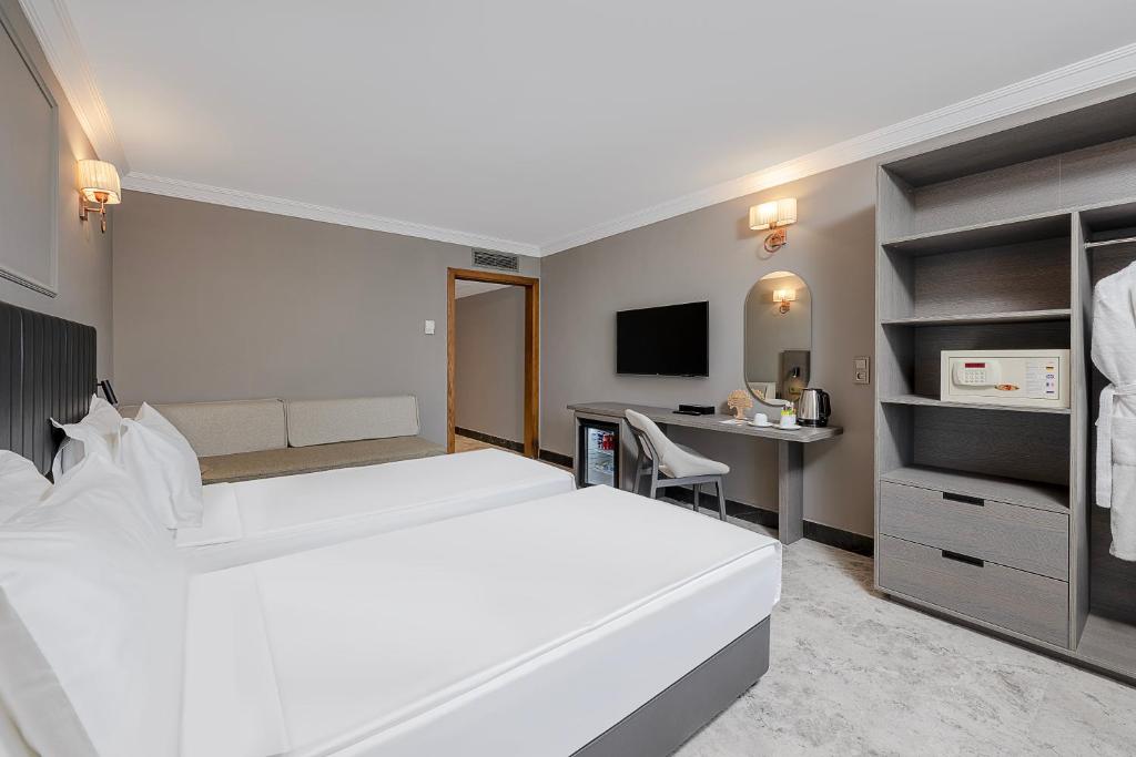 Mūsdienīgs numurs ar divām gultām Adora Hotel & Resort