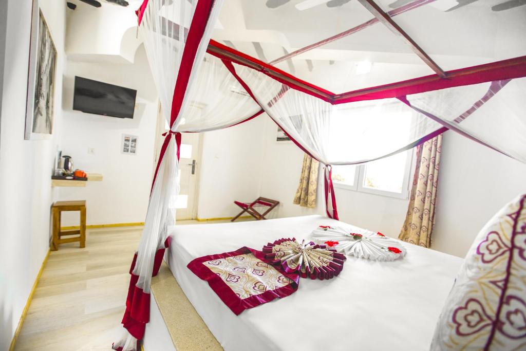 Elegants numurs ar baldahīnu AHG Dream's Bay Beach viesnīcā