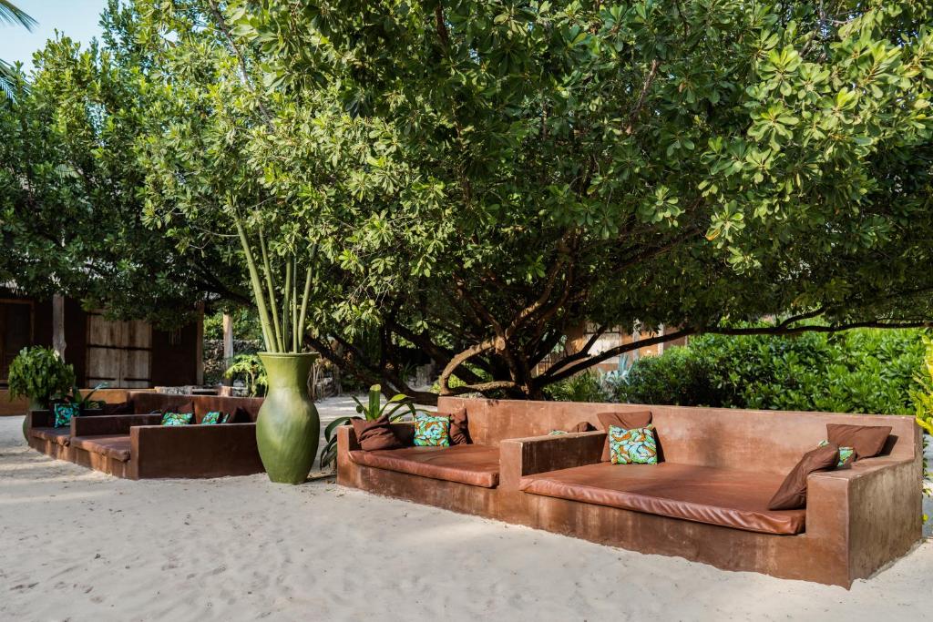 Atpūtas zona zem kokiem Mwezi Boutique Resort