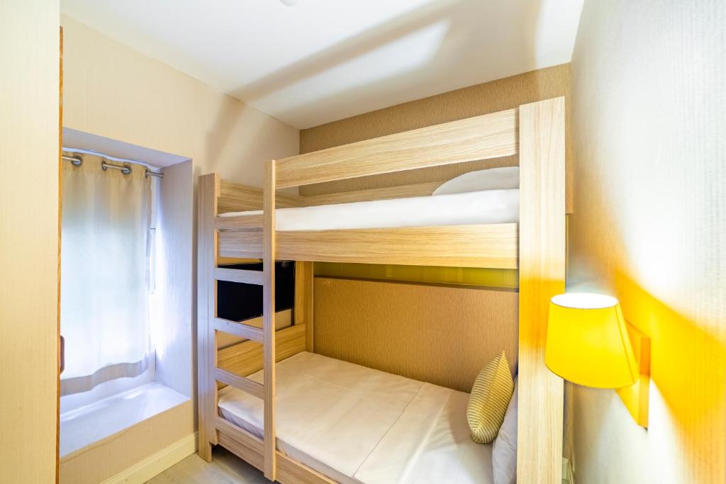 Numurs ar divguļamo gultu Ulusoy Kemer Holiday Club, gaišs un mājīgs.