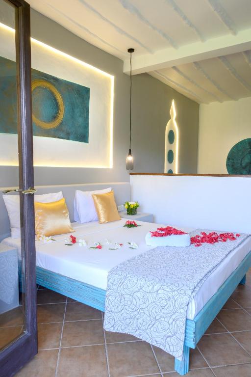 Numurs ar modernu dizainu un dekorācijām viesnīcā VOI Kiwengwa Beach.