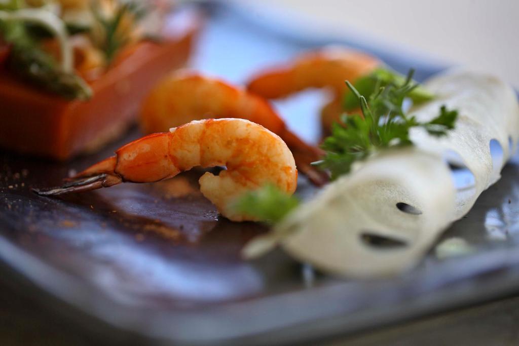 Gardi jūras velšu ēdieni The Residence Zanzibar viesnīcā.