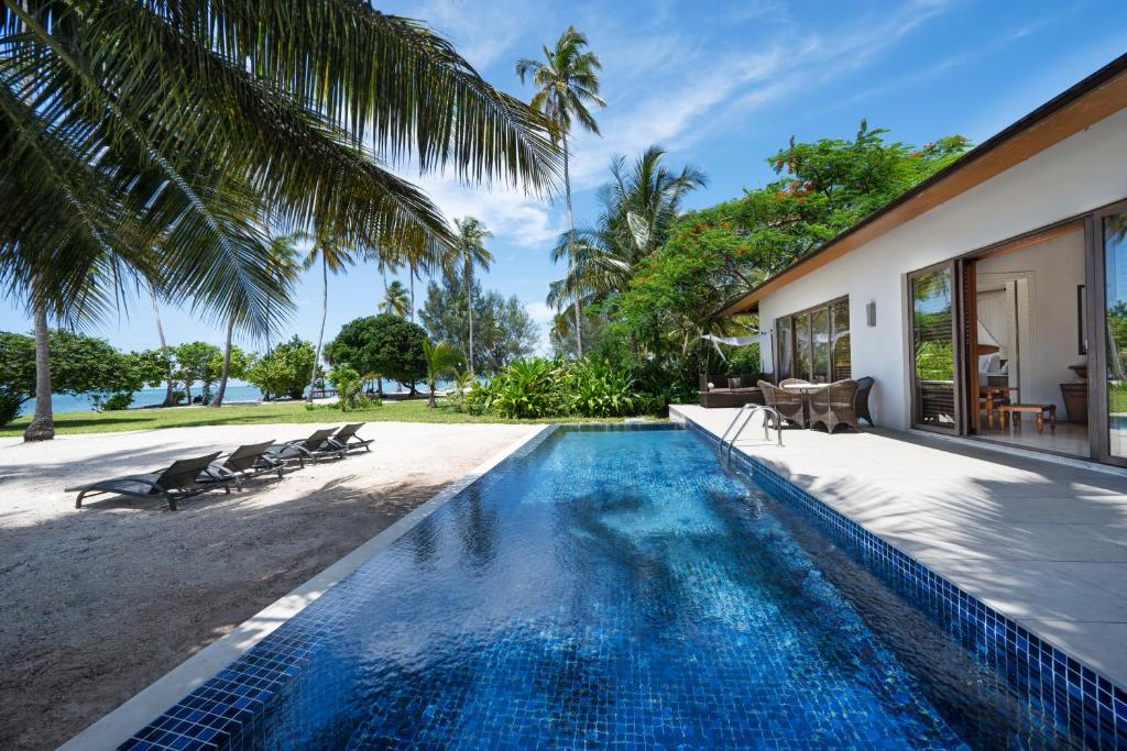 The Residence Zanzibar villa with private pool and beachfront view.