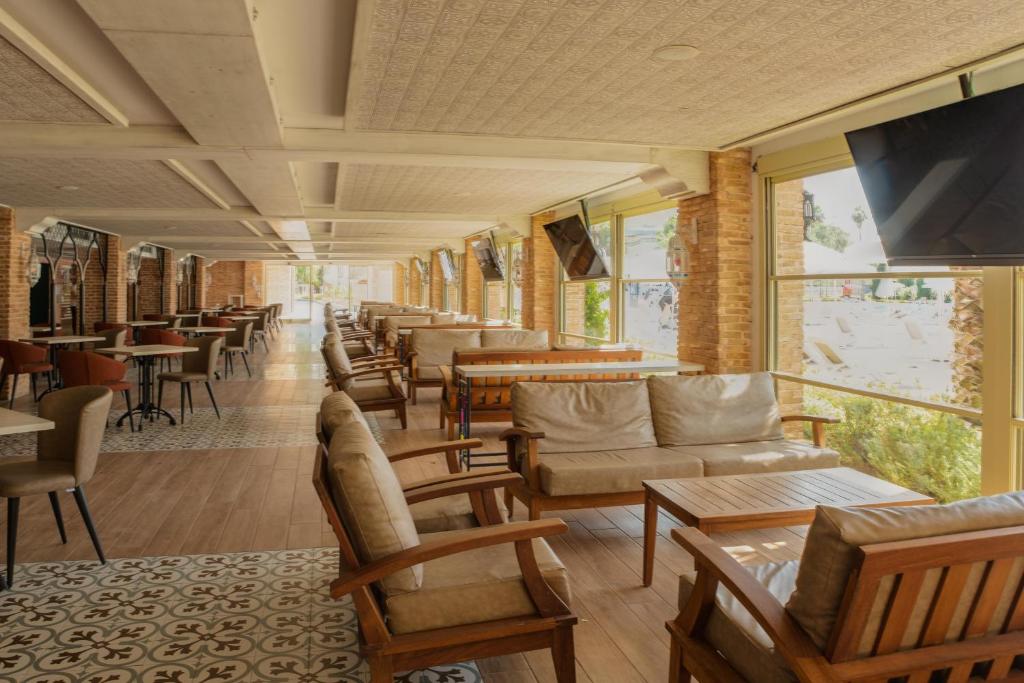 Mūsdienīgs interjers Swandor Hotels & Resorts Topkapi Palace, atpūtas zona ar komfortablām mēbelēm.