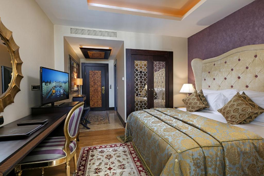 Elegants numurs Titanic Mardan Palace ar mīkstām gultām un modernām ērtībām.