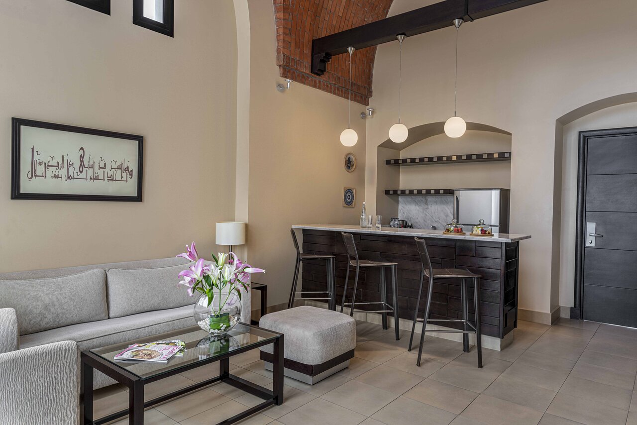 The Cove Rotana Resort elegant suite interior with modern decor