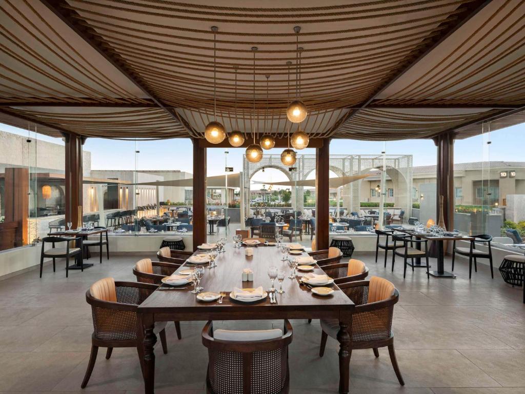 Eleganta restorāna iekārtojums Pickalbatros Golf Luxury Suites