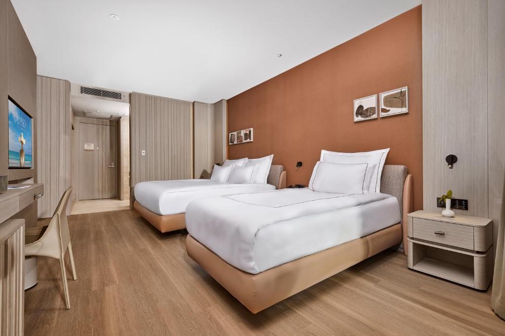 Lusso Sorgun viesnīcas moderns numurs ar divām gultām.