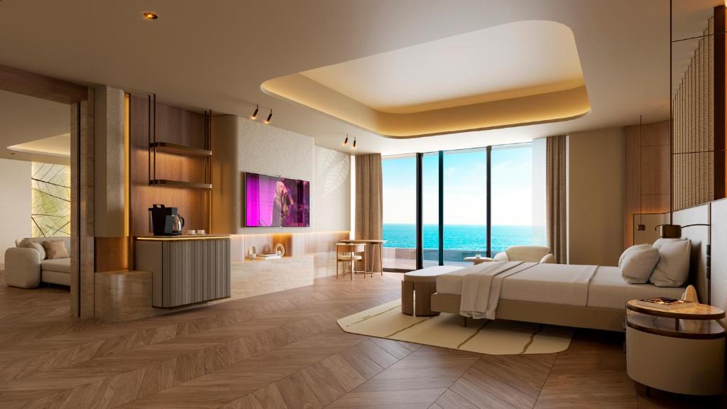 Mūsdienīgs viesnīcas numurs ar panorāmas skatu uz jūru, elegantu interjeru un plašu telpu. Izcila dizaina elementi un komforts nodrošina relaksējošu atmosfēru.