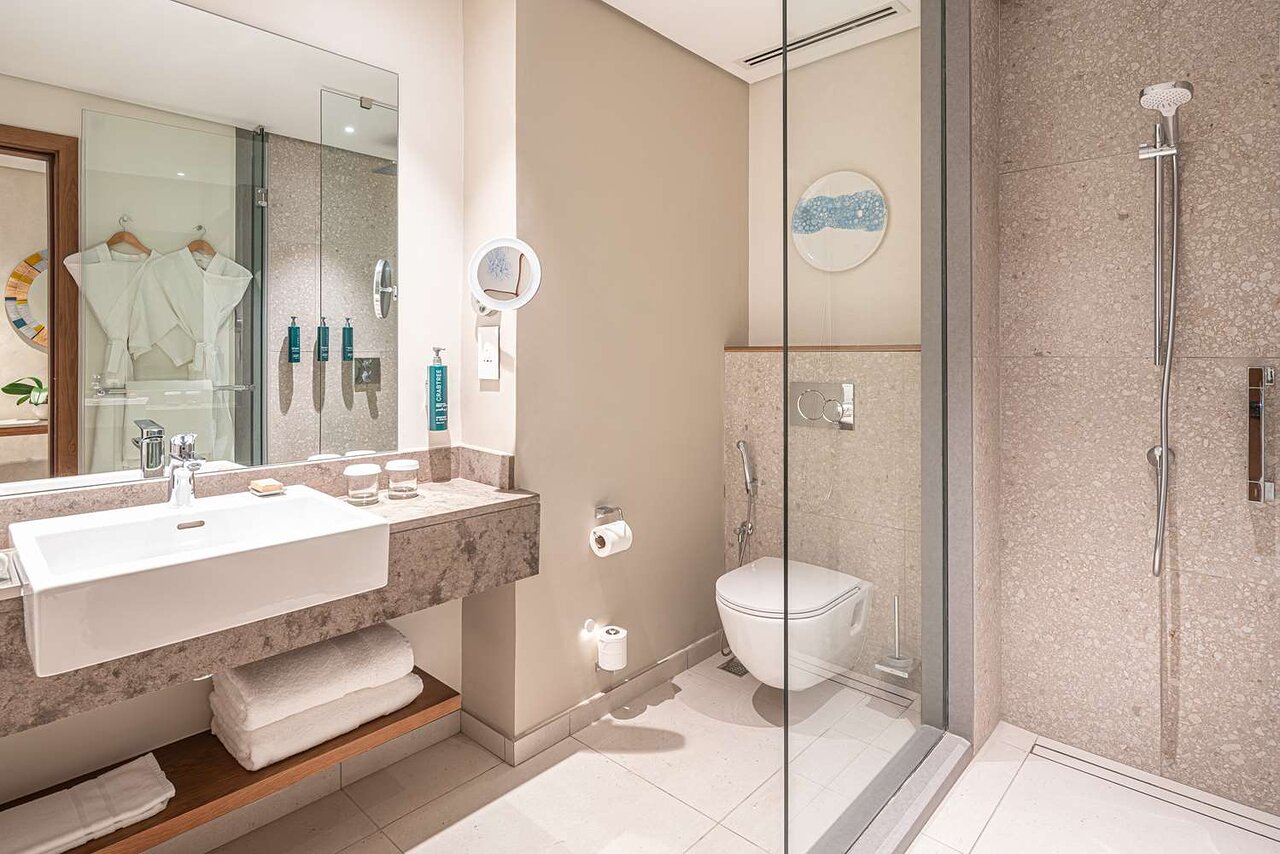 Hilton Mauritius Resort & Spa elegant bathroom with modern amenities.
