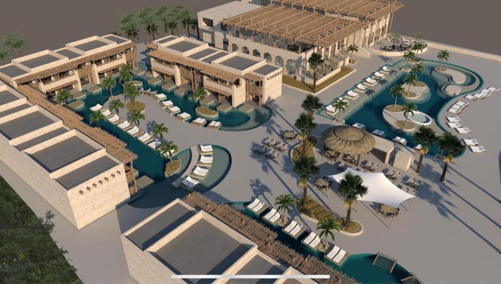 Mūsdienīgs kūrorts ar elegantiem baseiniem, palmām un atpūtas zonām, kas nodrošina relaksējošu atmosfēru. Arhitektūra apvieno tradicionālo stilu ar mūsdienīgām ērtībām.