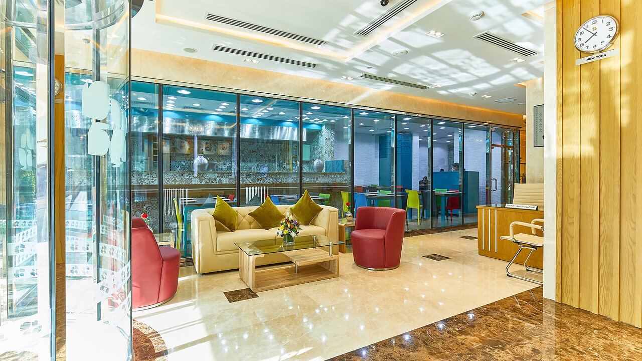 Rose Plaza Al Barsha modern lobby with seating area.