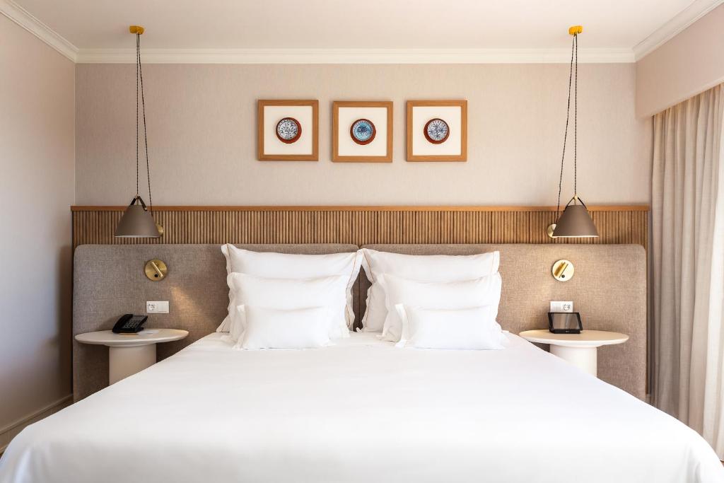 Eleganta divguļamā gulta ar mīkstiem spilveniem Grande Real Santa Eulalia Resort & Hotel Spa